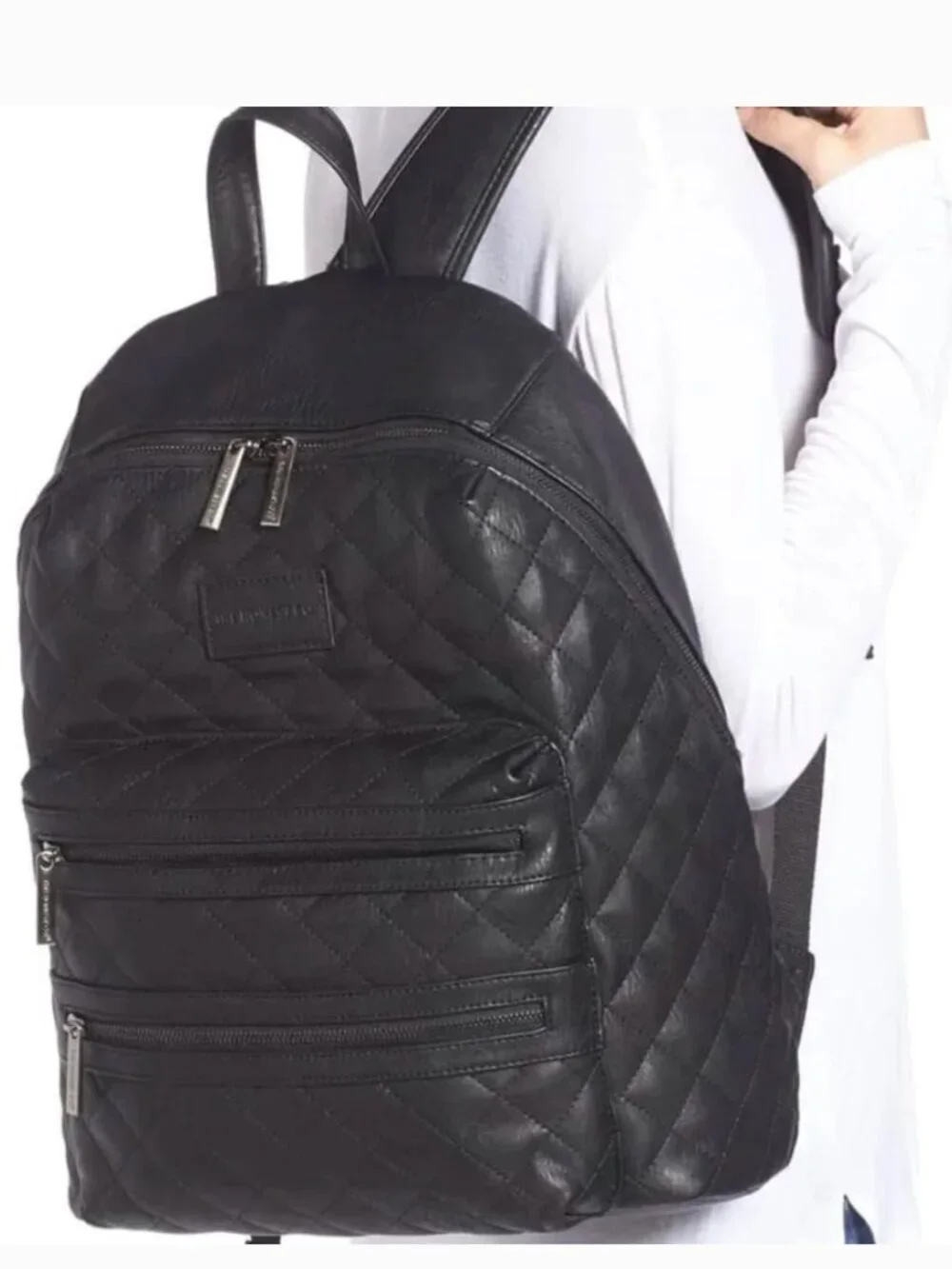 The Honest Company Diamond Quilted Black Faux Leather Backpack